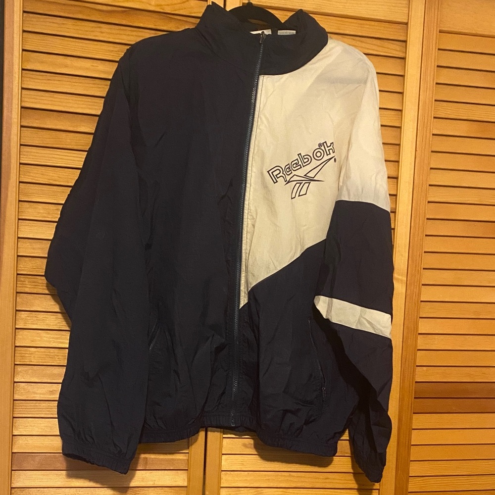 Vintage 1980’s Men’s Reebok Size Large White/Navy Blue Colorblock Windbreaker